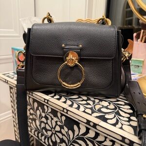 Black Leather Shoulder Bag with Gold Ring Accent